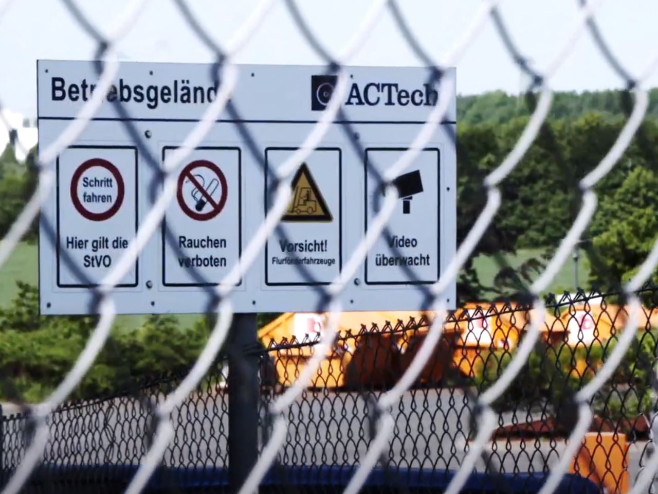 Sign behind fence with rules of conduct on the premises at ACTech.